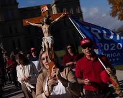 Crucifix/Jesus with Trump flag in parade