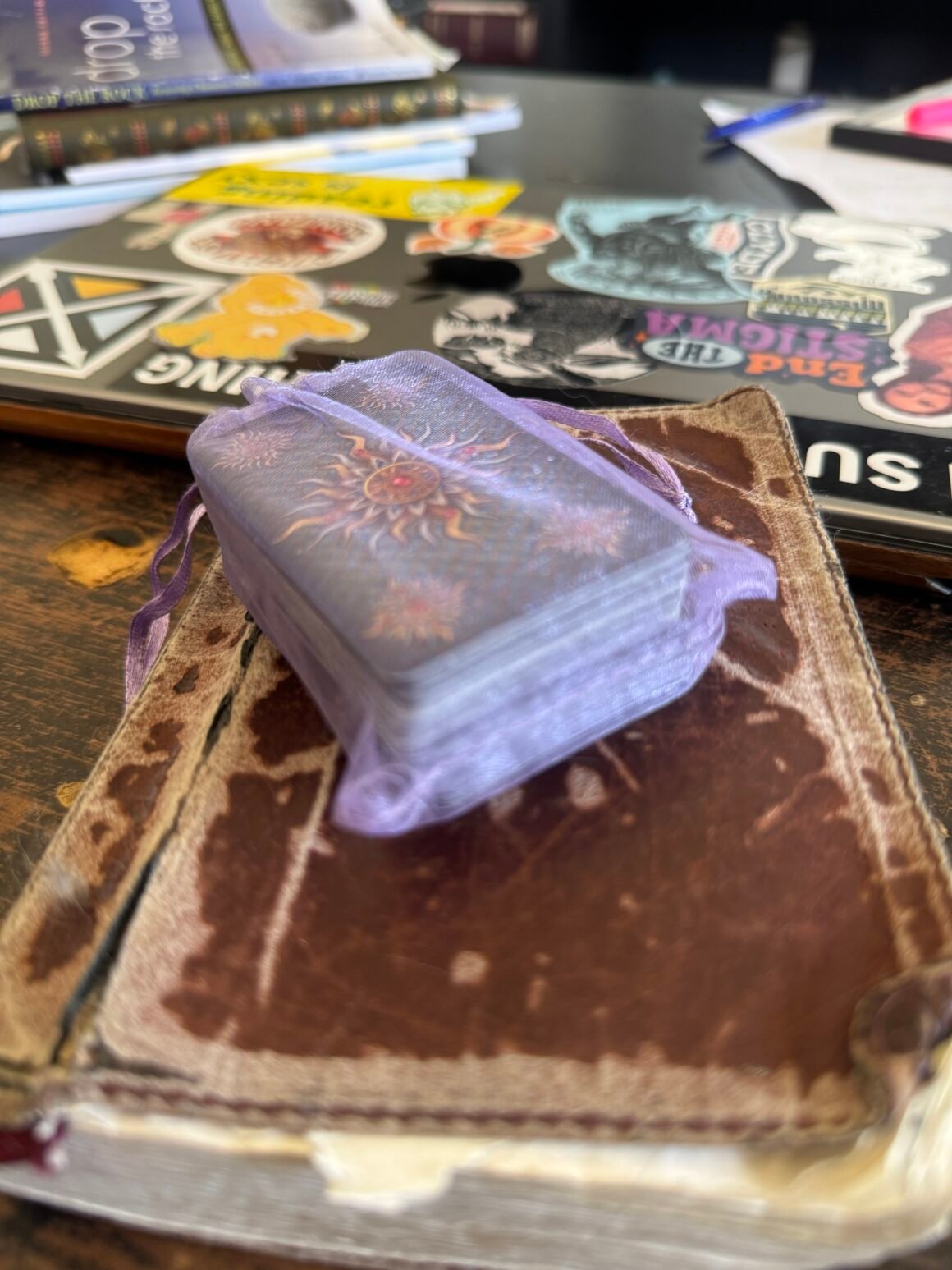 A mini tarot deck on a small ESV bible